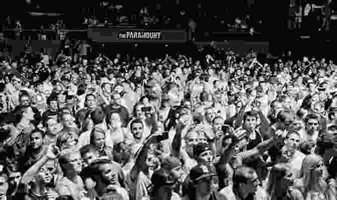 A Crowd Of Enthusiastic Fans At A Rock And Roll Concert American Popular Music David Lee Joyner